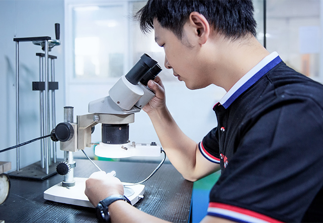 Microscope assisted deburring