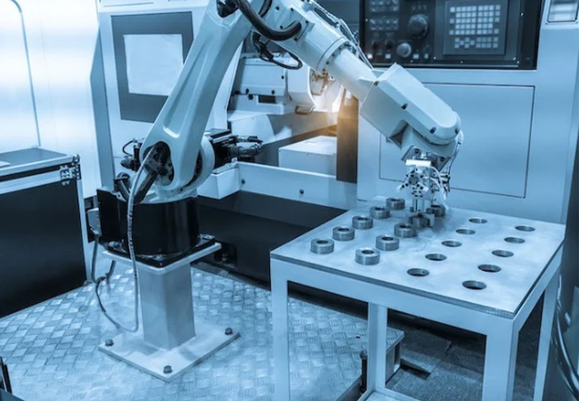 robotic arms for machine tending